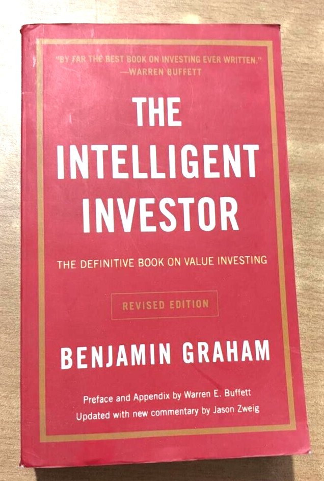The Intelligent Investor by Benjamin Graham, Paperback…..