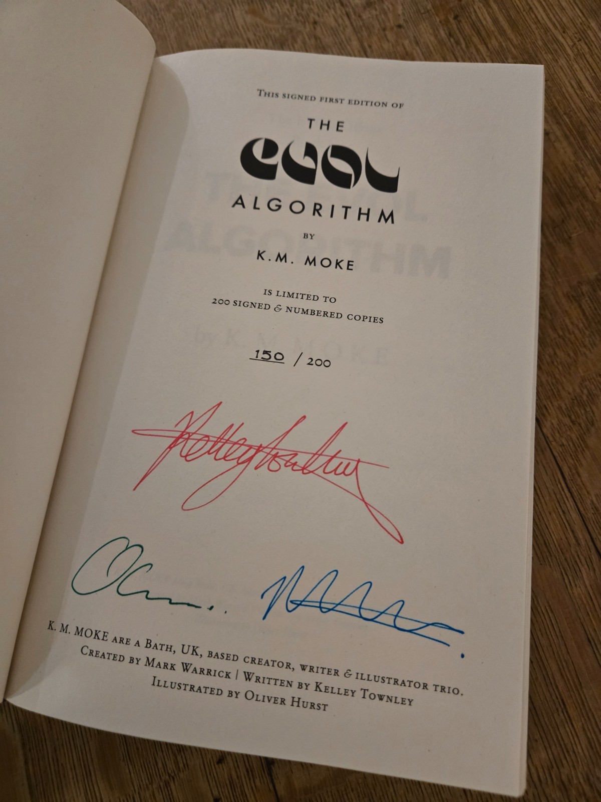 RARE/MINT: The EVOL Algorithm by K.M. Moke – Worldbuilders Triple Signed 150/200