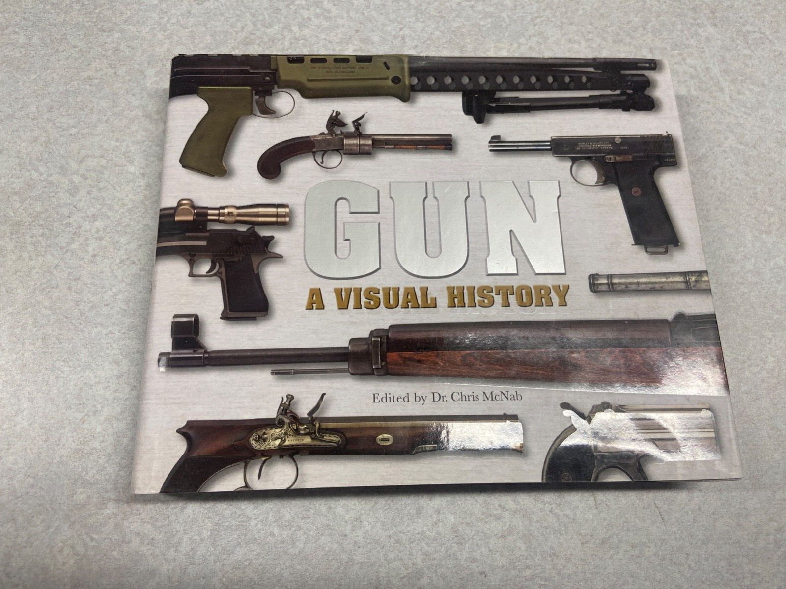 GUN-A VISUAL HISTORY BY DR. CHRIS McNABB, 360 PAGES. LIKE NEW.