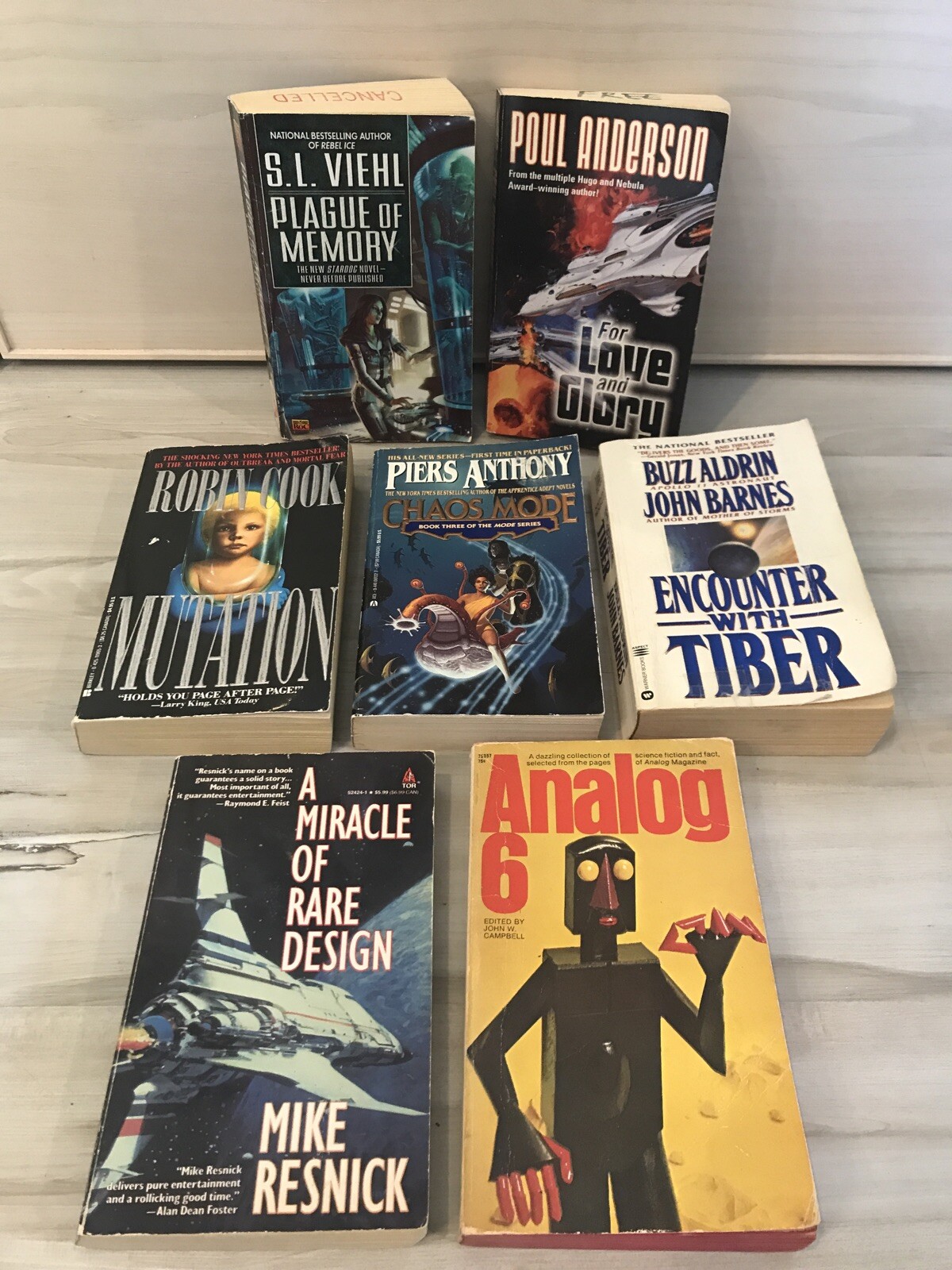 Mixed Lot Of 7 Sci Fi- Anderson- Viehl- Resnick- Campbell- Cook- Anthony- Aldrin