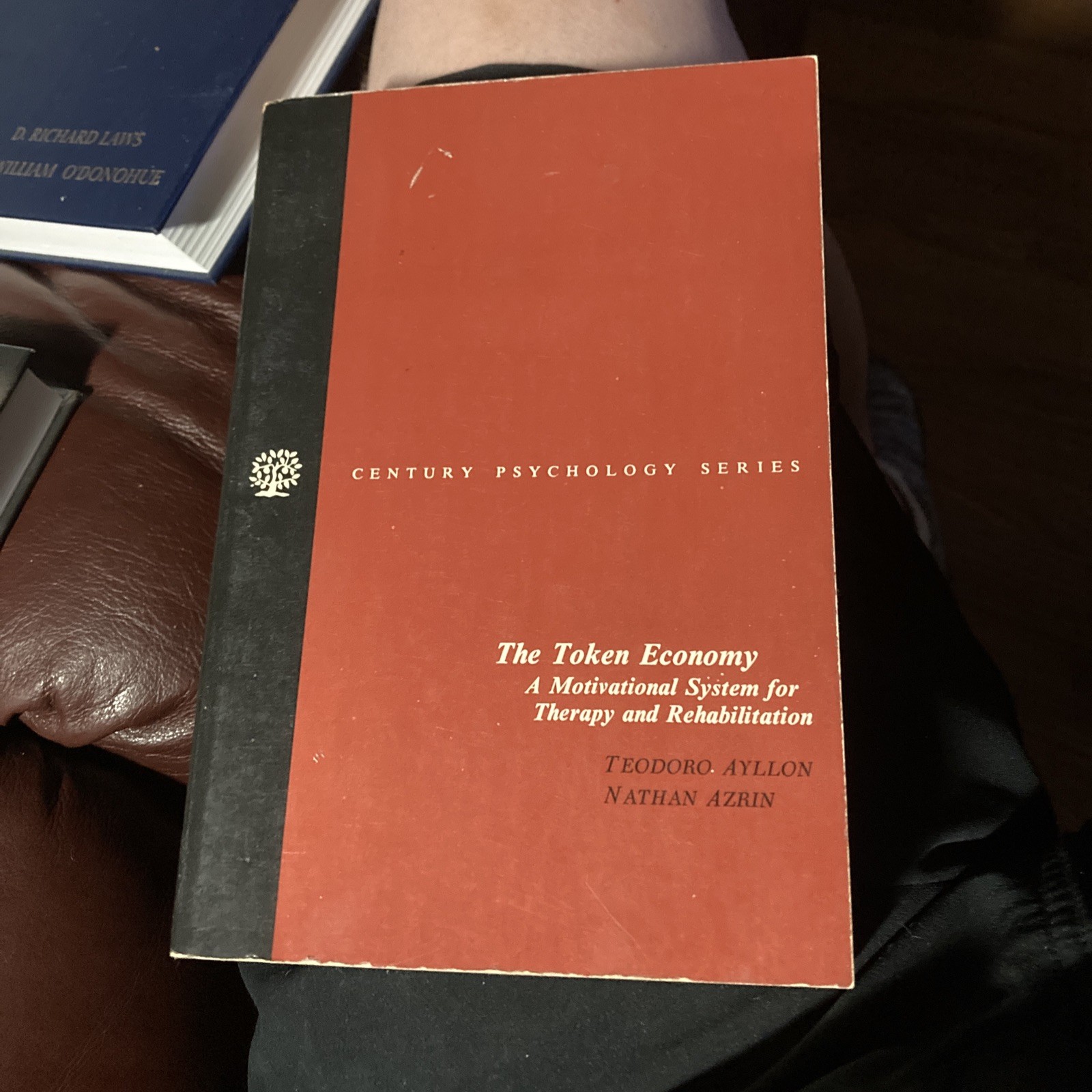 THE TOKEN ECONOMY: A MOTIVATIONAL SYSTEM FOR THERAPY AND By Teodoro Ayllon