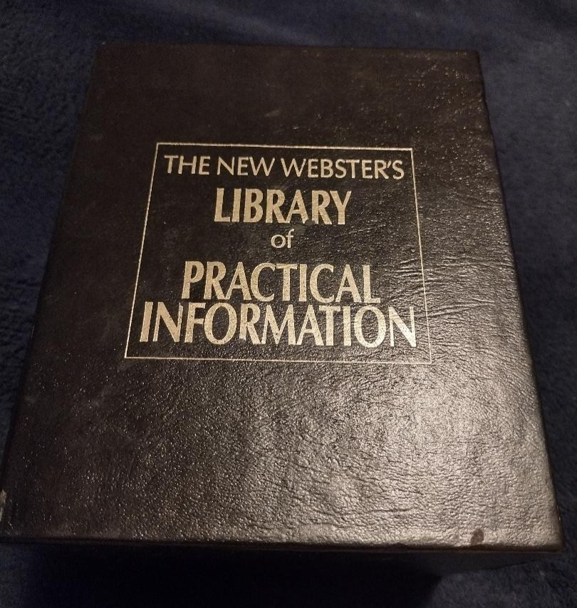 The New Webster’s Library of Practical Information desktop set of 7. Aged.