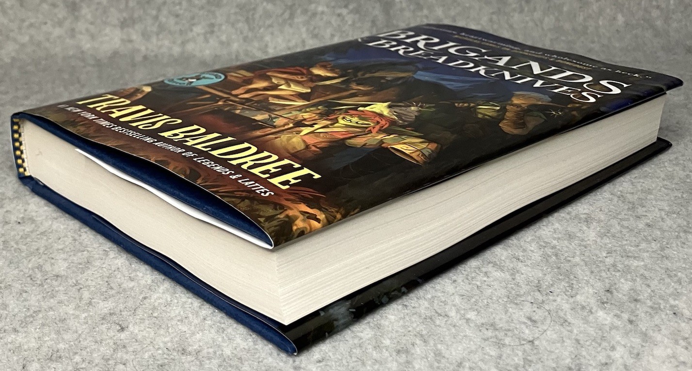 Brigands and Breadknives Travis Baldree 2025 Hardcover Signed 1st Ed w/Sticker