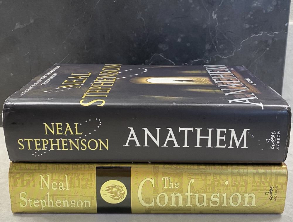 2 bk lot by Neal Stephenson: The Confusion, and Anathem (Hardcover 1st Editions)