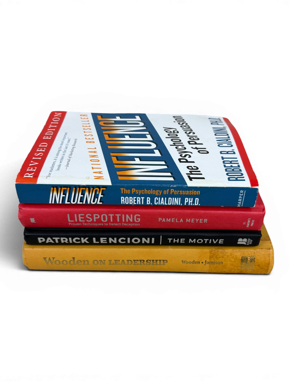 4-Book Lot: Influence, Liespotting, The Motive, Wooden on Leadership